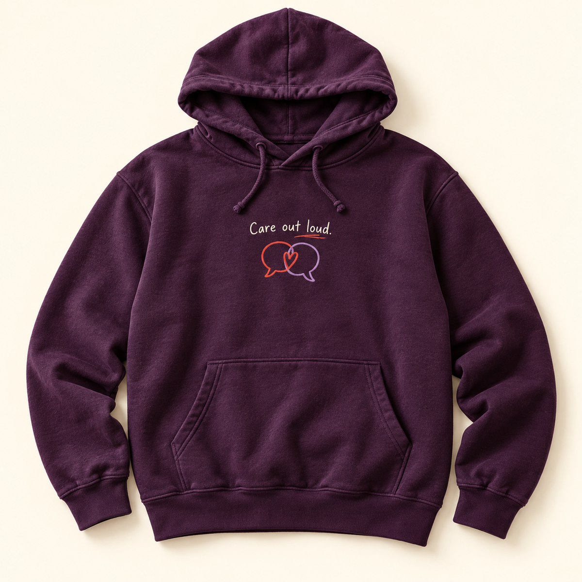 Plum hoodie with cream Care out loud lettering, overlapping coral and lavender speech bubbles, and a heart on the chest